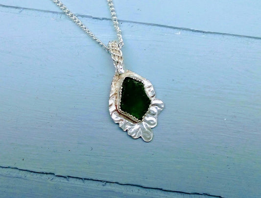Sea Glass with reflections of the moon in Silver.